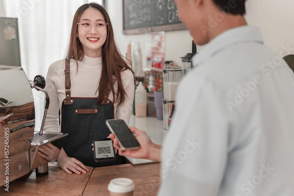 Obraz Barista engaging with customer, coffee shop, beverage service, cozy atmosphere, lively interaction