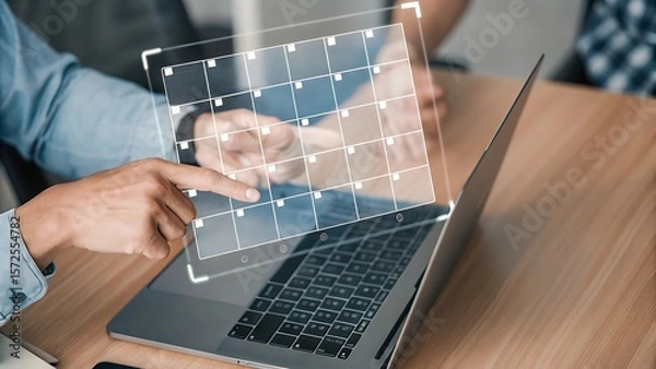 Obraz Managing Schedule Online: Person Interacting with a Digital Calendar Interface on a Laptop for Planning and Organization.