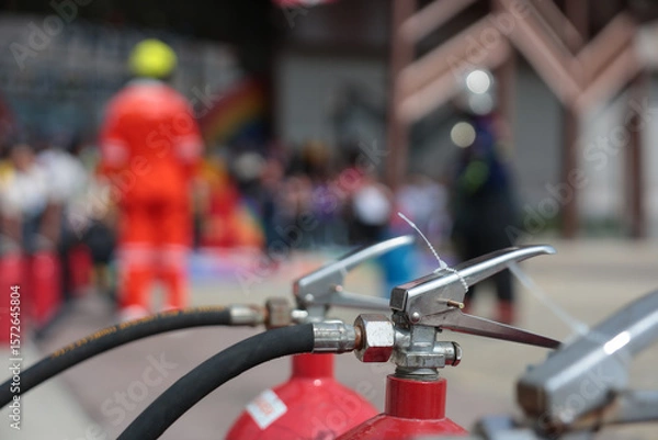Fototapeta Company employees are undergoing basic fire extinguishing training, fire extinguisher use, safety week, fire prevention, loss prevention,	
