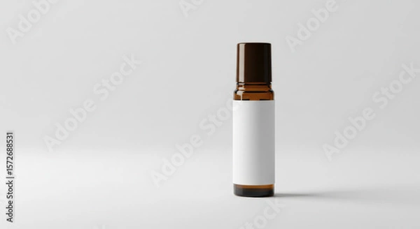 Fototapeta Aromatherapy Roller Bottle with Blank Label on Light Background