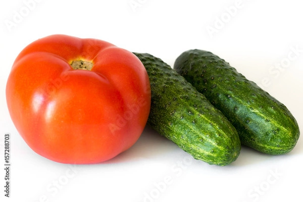 Fototapeta Tomato and cucumbers isolated on white background