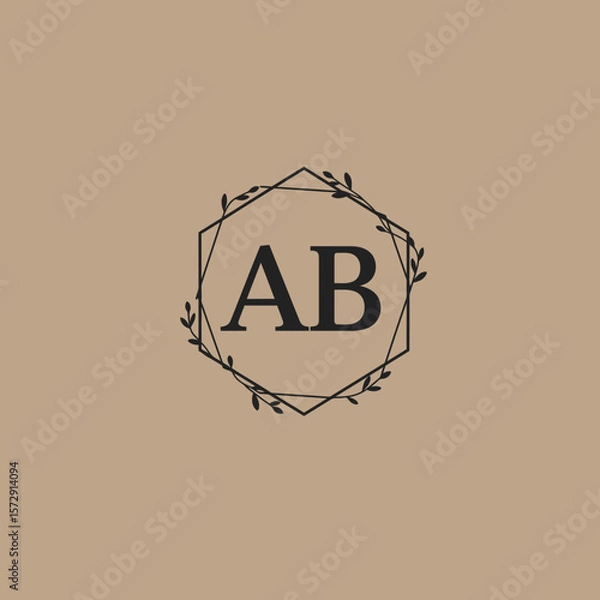Fototapeta Elegant monogram logo design featuring the letters AB enclosed within a stylish hexagonal frame adorned with delicate floral elements.