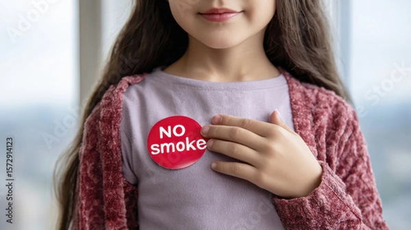 Obraz Young Girl Wearing No Smoking Campaign Badge While Promoting Health Awareness by a Window