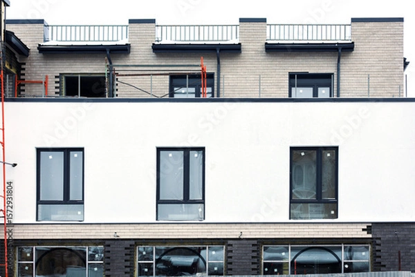 Obraz Construction new modern building in winter.