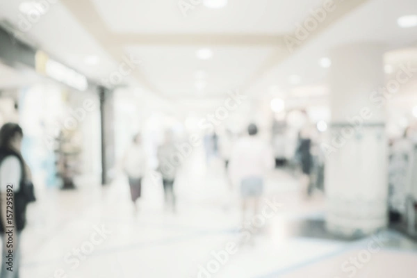 Fototapeta Blurred image background, people at shopping mall blur background with bokeh and vintage tone.