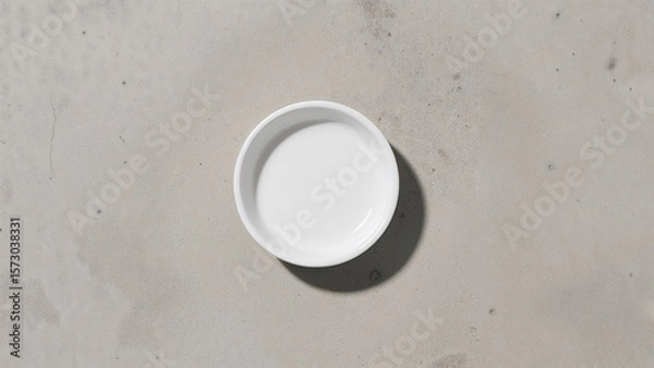 Fototapeta Top-Down View of Ceramic Dish on Concrete Background, Minimal Product Mockup Scene