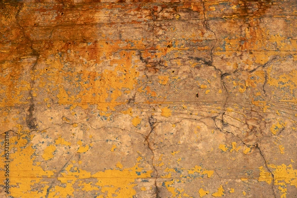 Obraz Grunge rusty metal texture with orange, brown and red corrosion patterns forming abstract industrial background for design, printing, overlays, wall textures and creative use.