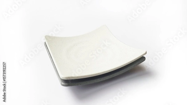 Fototapeta Stack of empty square white and grey plates with ceramic melamin material isolated on white background