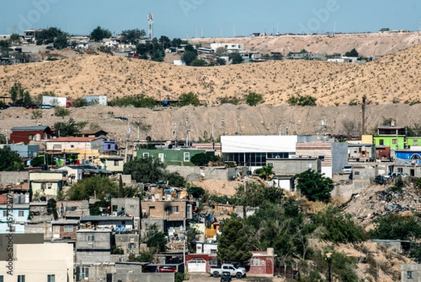 Obraz Cityscape View of Ciudad Juarez Mexico as seen from the highway in El Paso Texas.
