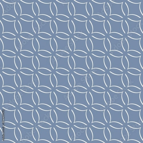 Fototapeta A geometric pattern composed of interlocking circles and diamonds is set against a dark gray background. The intricate design creates a sense of symmetry and repetition.