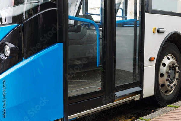 Obraz Entrance of a modern public transport bus with closed doors