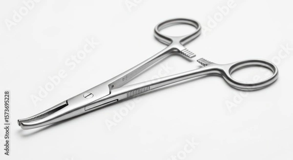 Fototapeta Surgical Instrument: A Close-Up View of Precision Medical Scissors on a White Surface