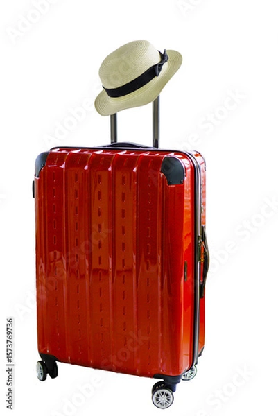 Fototapeta Red suitcase with straw hat isolated on transparent background. Ready for a peaceful vacation. Summer time, travel bag.