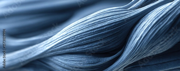 Obraz Intricate blue textured fabric in close-up showcasing waves and folds in a detailed view