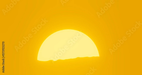 Fototapeta Sunrise over ocean surface with reflection 