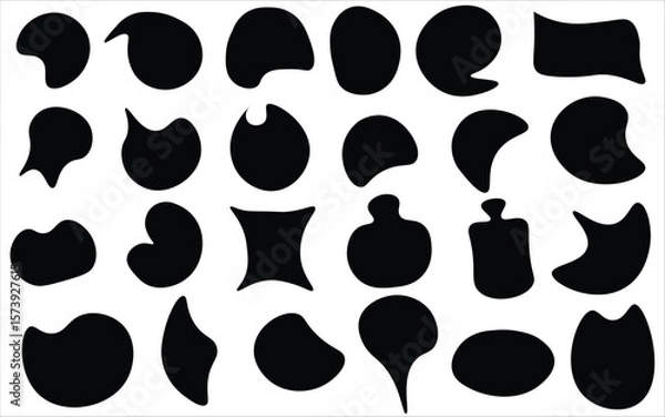 Fototapeta Abstract organic black shapes on white background  perfect for modern design elements, collage art, decorative visuals, scrapbooking, and playful digital compositions