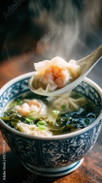 Fototapeta Fresh Shrimp Dumpling Soup with Steaming Broth and Green Onions