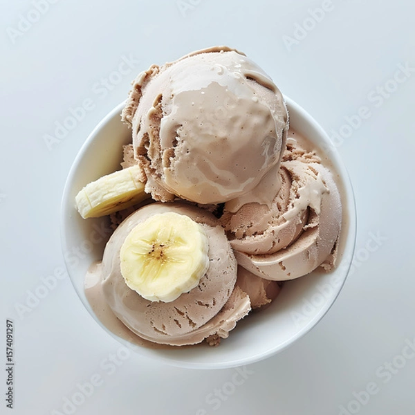 Fototapeta Chocolate banana ice cream in bowl close-up. Top view