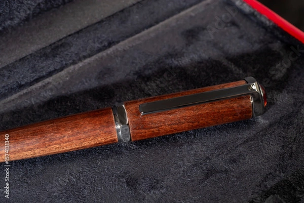 Obraz Branded pen with cufflinks and business card holder in a box. Gift set. Office interior.