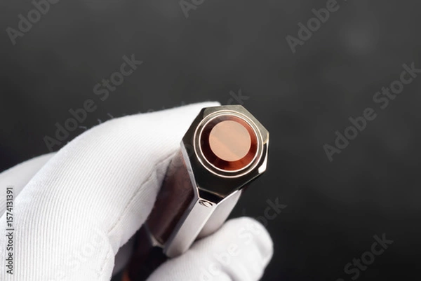Obraz Branded pen with cufflinks and business card holder in a box. Gift set. Office interior.