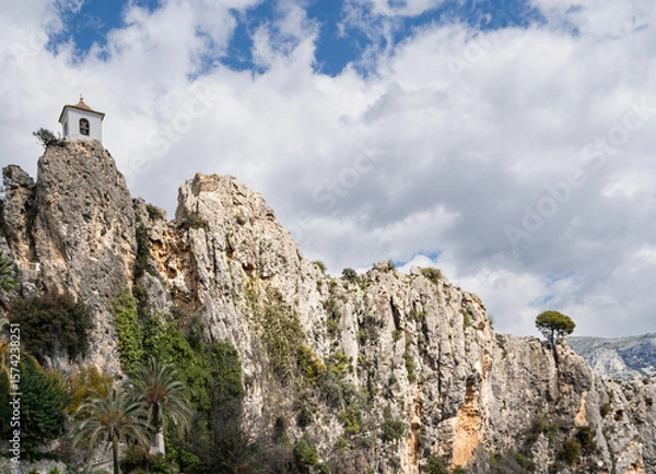 Fototapeta High on a ridge above the village of Guadalest is El Castell de Guadalest