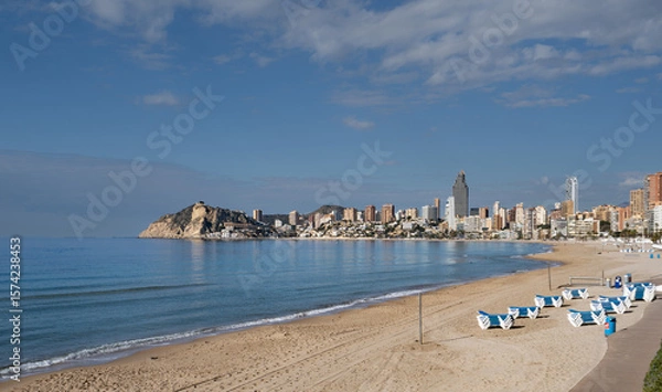 Fototapeta Early morning and an almost deserted Poniente Beach in Spain's Benidorm