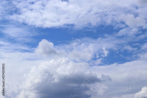 Fototapeta Cloudy sky, sky in gray clouds. Nature background. Weather before rain. Landscape with cloudy sky