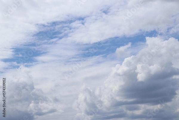 Fototapeta Cloudy sky, sky in gray clouds. Nature background. Weather before rain. Landscape with cloudy sky