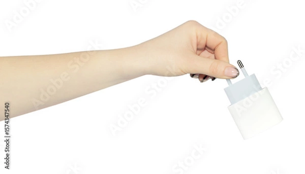 Fototapeta Original network charger for phone in hand, outstretched hand with network charger for phone, isolated from background, concept of using only safe branded devices