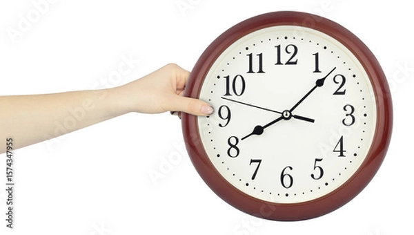 Fototapeta round wall clock in hand, outstretched hand with round wall clock isolated from background, time concept