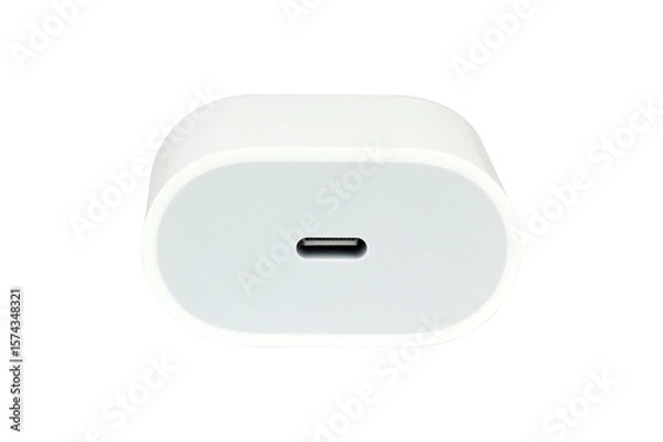 Fototapeta Original network charger, block for charging the phone. Isolated from the background.