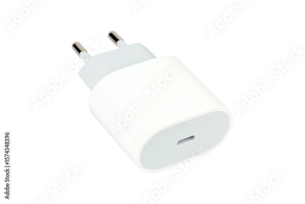 Fototapeta Original network charger, block for charging the phone. Isolated from the background.