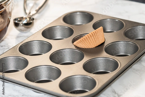 Obraz Baking Chocolate Cupcakes with Decadent Chocolate Frosting