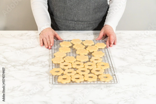 Obraz Hands Holding Cookie Sandwich Shells