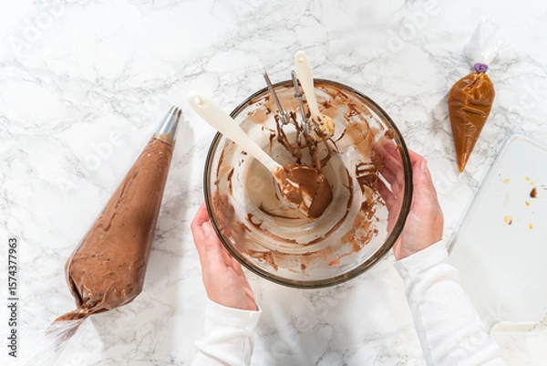 Obraz Baking Chocolate Cupcakes with Decadent Chocolate Frosting
