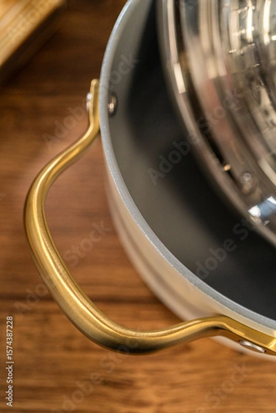 Obraz Golden Handle Ceramic Pot with Steamer Insert