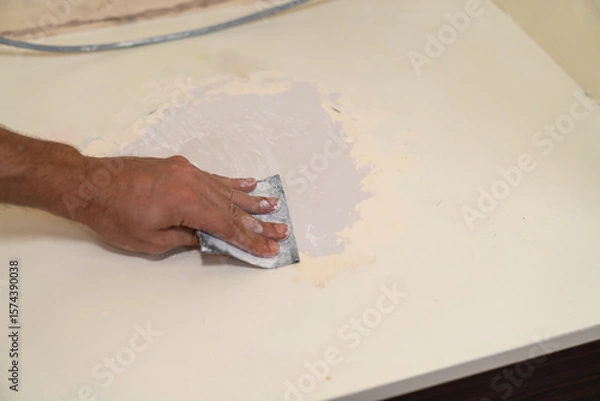 Fototapeta Close up of sanding surface with paper.