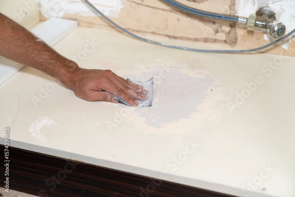 Fototapeta Close up of sanding surface with paper.