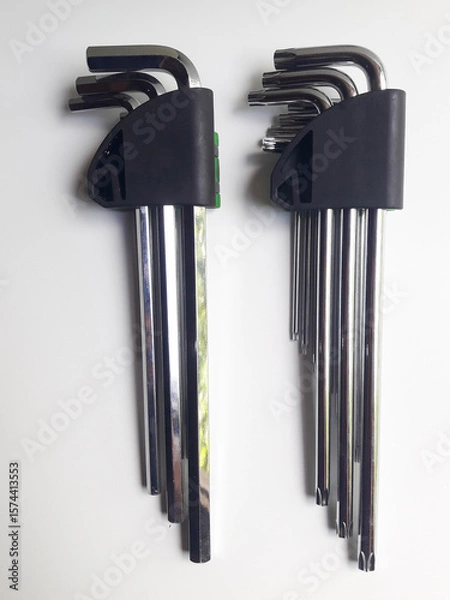 Fototapeta A set of torx keys or star L keys isolated on a white background, used to tighten or loosen shaped bolts.