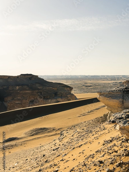 Fototapeta White rock formations and sand dunes in Egypt's White Desert, natural desert landscape	