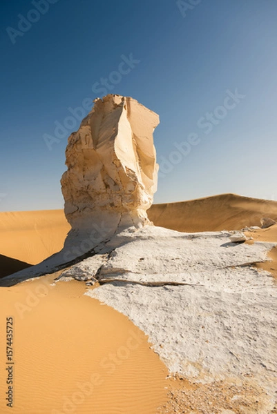 Fototapeta White rock formations and sand dunes in Egypt's White Desert, natural desert landscape	