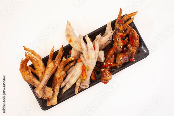 Obraz Three different ways to cook chicken feet isolated on white