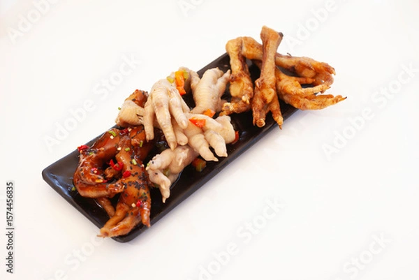 Obraz Different ways to cook chicken feet isolated on white