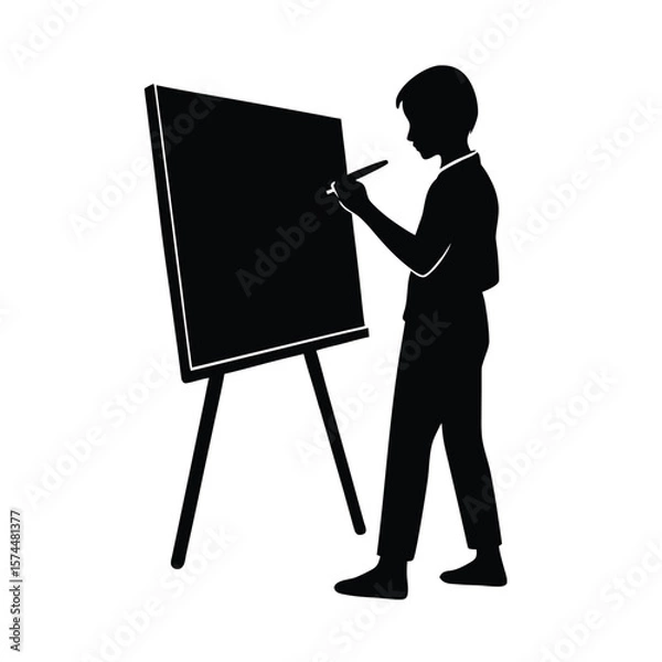 Fototapeta Silhouette of a student writing on a chalkboard with a chalk stick easel