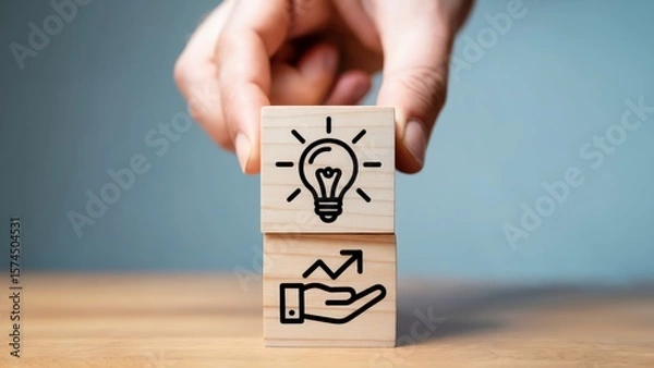 Obraz Business growth concept with lightbulb icon and hand holding arrow pointing up