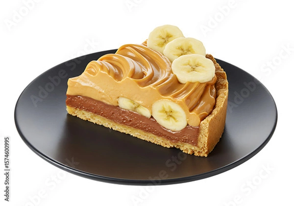 Fototapeta Slice of banana cream pie on a black plate topped with banana slices and caramel