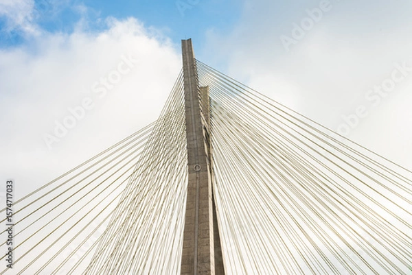 Obraz suspension bridge over blue sky