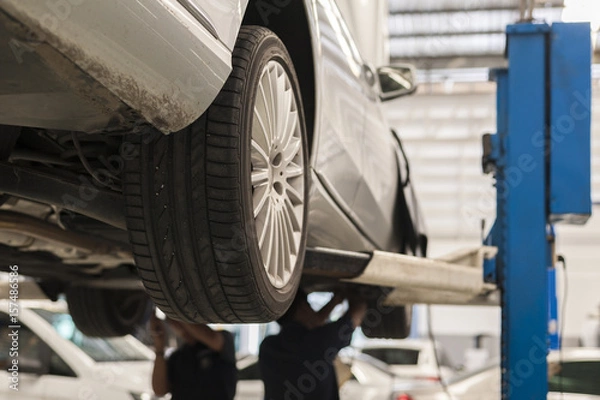 Obraz Mechanic repairing a car