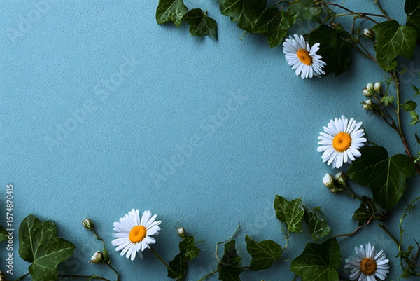 Fototapeta Fresh and Delicate Daisies with Ivy Border on a Light Blue Background