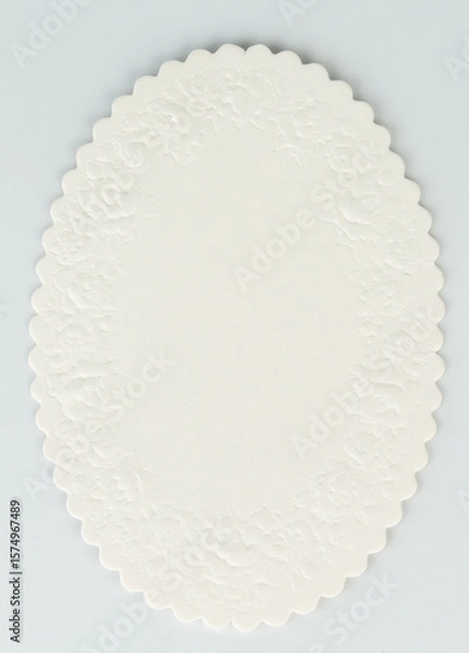 Obraz Decorative white oval label with intricate edges displayed on neutral background